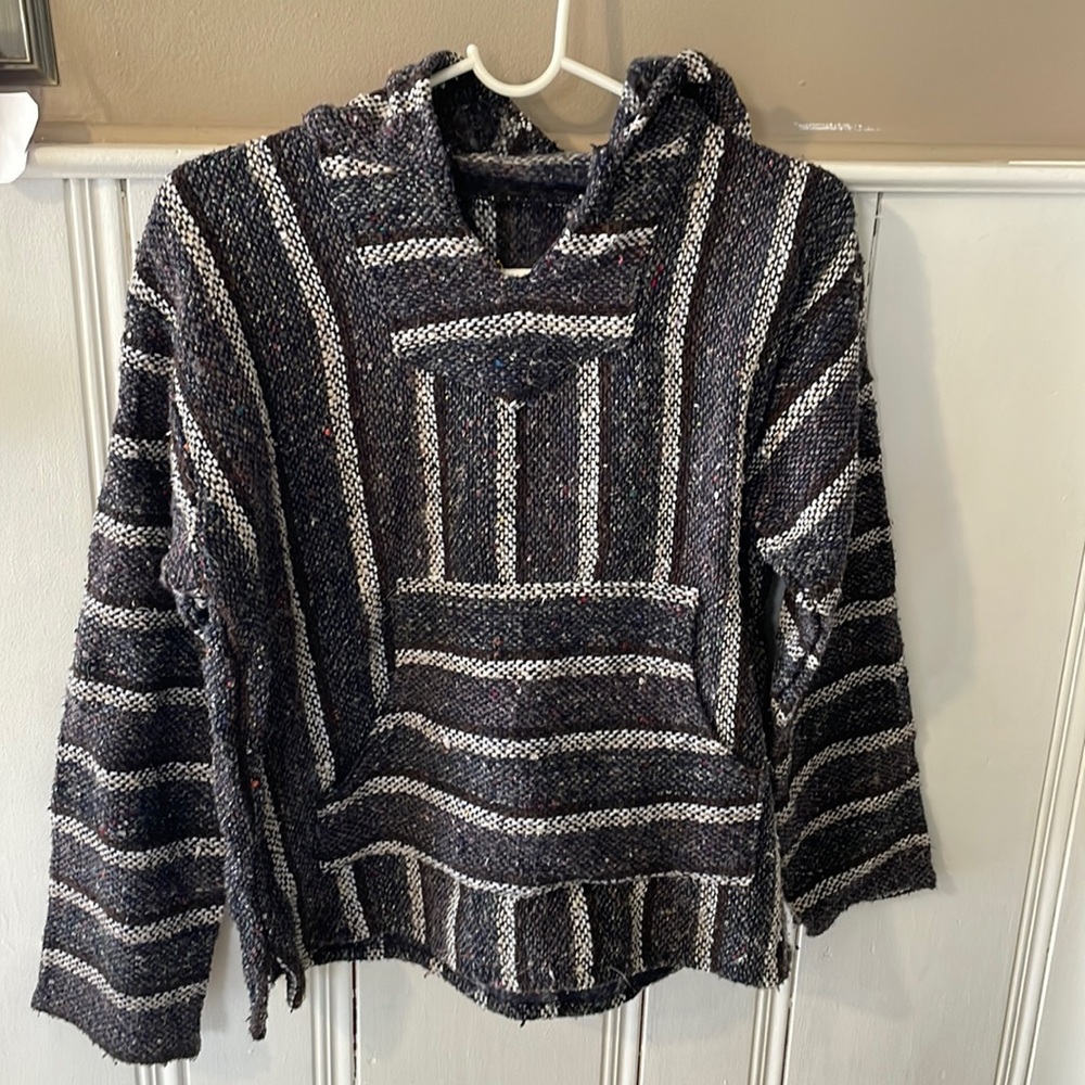 A pre loved sweater. in mix color of black-gray-white.No size tag.